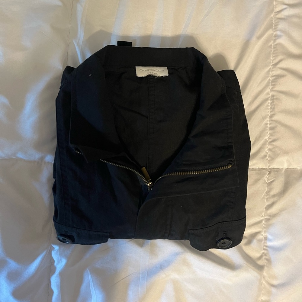 Super cute, vintage women’s coat, has an adjustable synched waist, no flaws:)